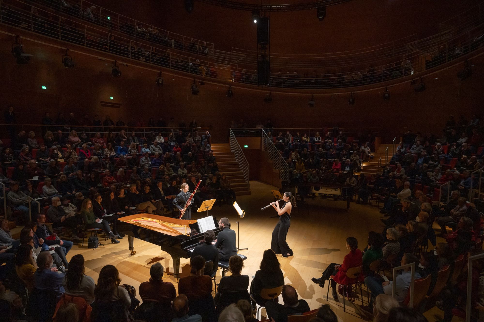 Rafaela Carvalho performing chamber music in a concert hall