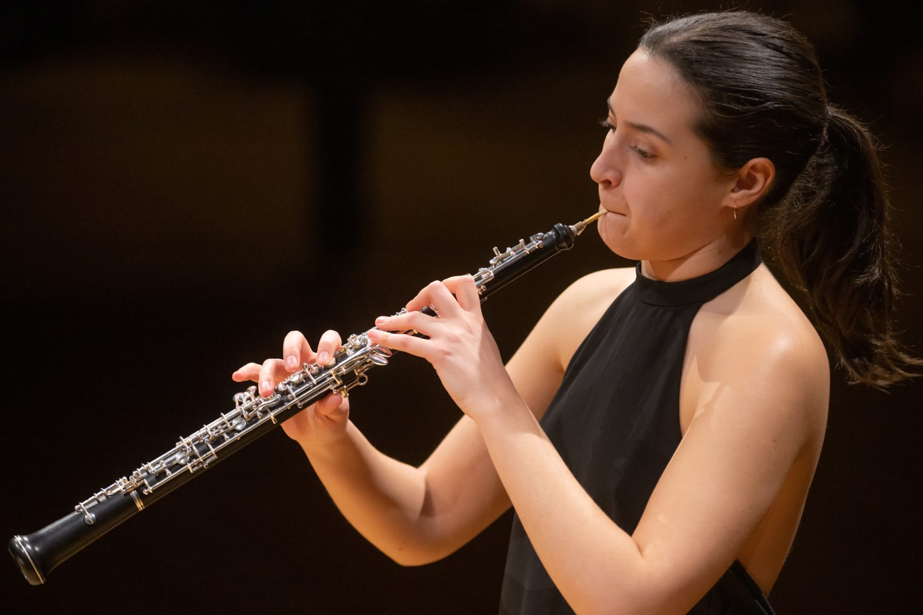 Playing the oboe on stage
